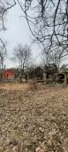Нежилое здание площадью 63,8 кв. м, расположенное на земельном участке площадью 1266 кв. м в Зеленогорске на улице Мира.